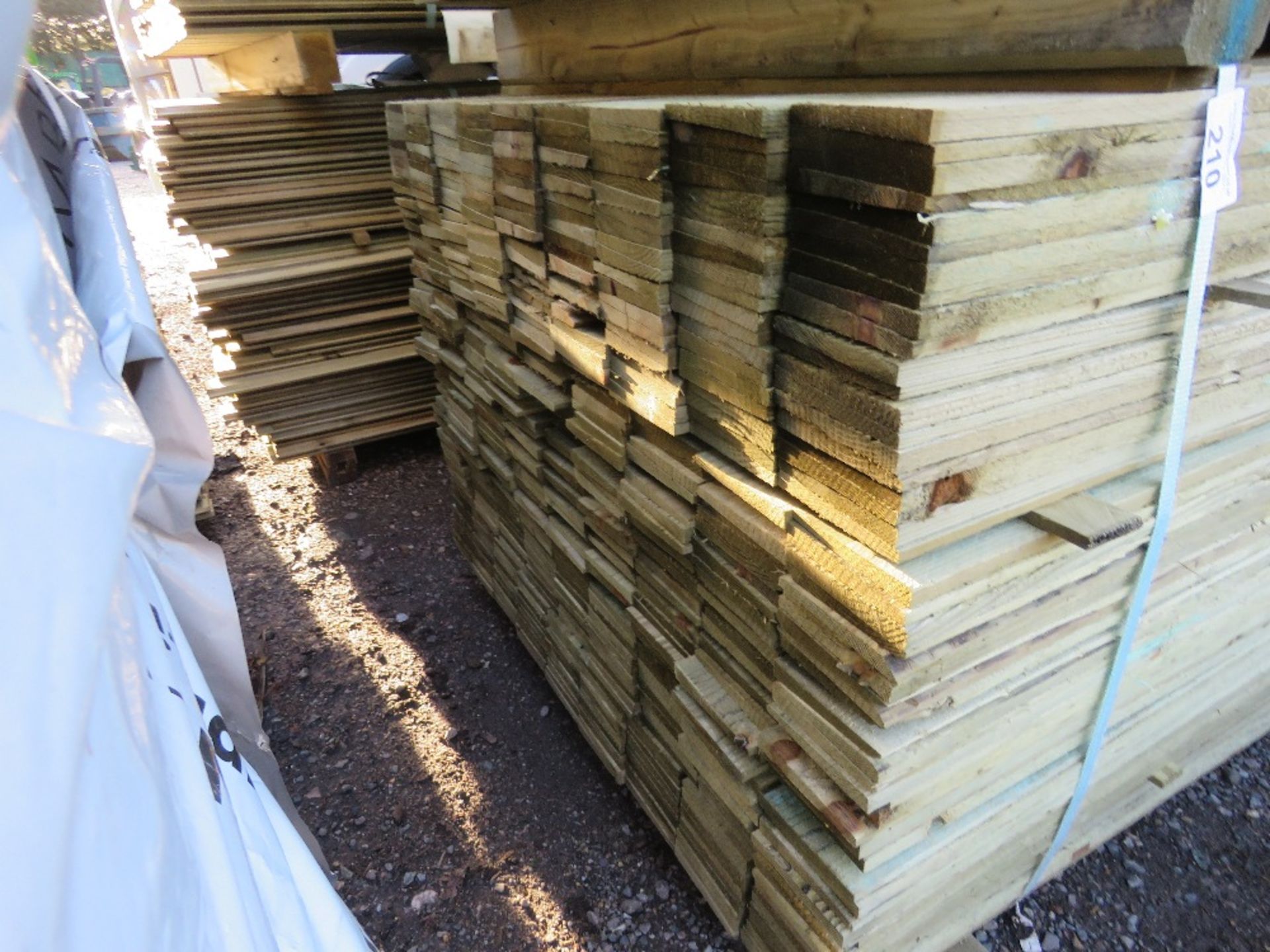 LARGE PACK OF FEATHEREDGE TREATED TIMBER CLADDING BOARDS. 1.8M LENGTH X 100MM WIDTH APPROX - Image 2 of 3