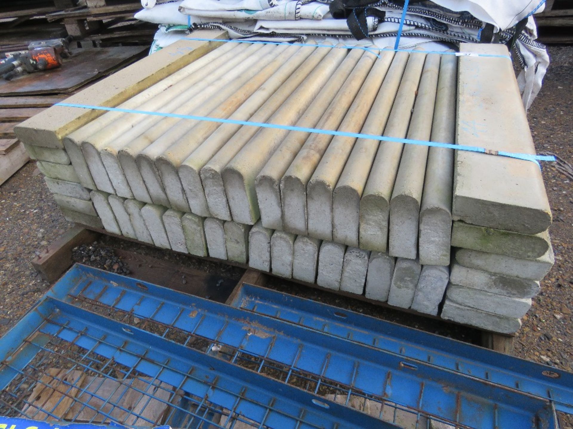 PALLET CONTAINING 44 NO. BALL NOSE CONCRETE CURBS. 6 INCH X 2 INCH X 36 INCH APPROX.