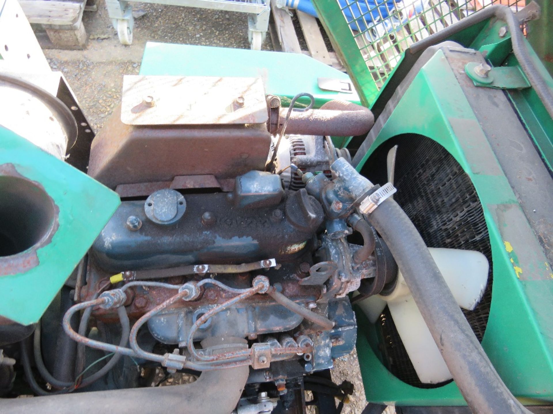 RANSOMES TRIPLE RIDE ON MOWER WITH KUBOTA ENGINE. BEEN IN STORAGE FOR SOME TIME. WHEN BRIEFLY TESTED - Image 9 of 12