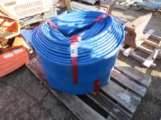 2 X LAY FLAT HOSES. 6 INCH WIDTH APPROX. LITTLE/ UNUSED. THIS LOT IS SOLD UNDER THE AUCTIONEERS