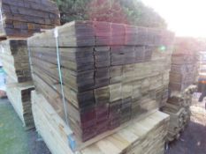 LARGE PACK OF FEATHEREDGE TREATED TIMBER CLADDING BOARDS. 1.65M LENGTH X 100MM WIDTH APPROX