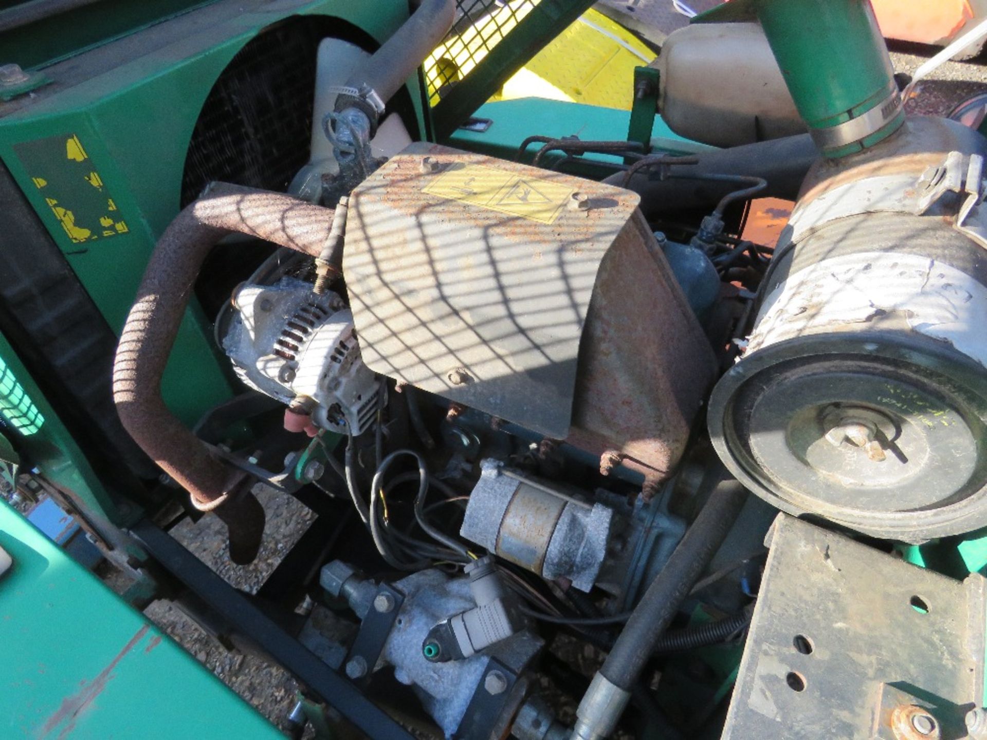 RANSOMES TRIPLE RIDE ON MOWER WITH KUBOTA ENGINE. BEEN IN STORAGE FOR SOME TIME. WHEN BRIEFLY TESTED - Image 10 of 12