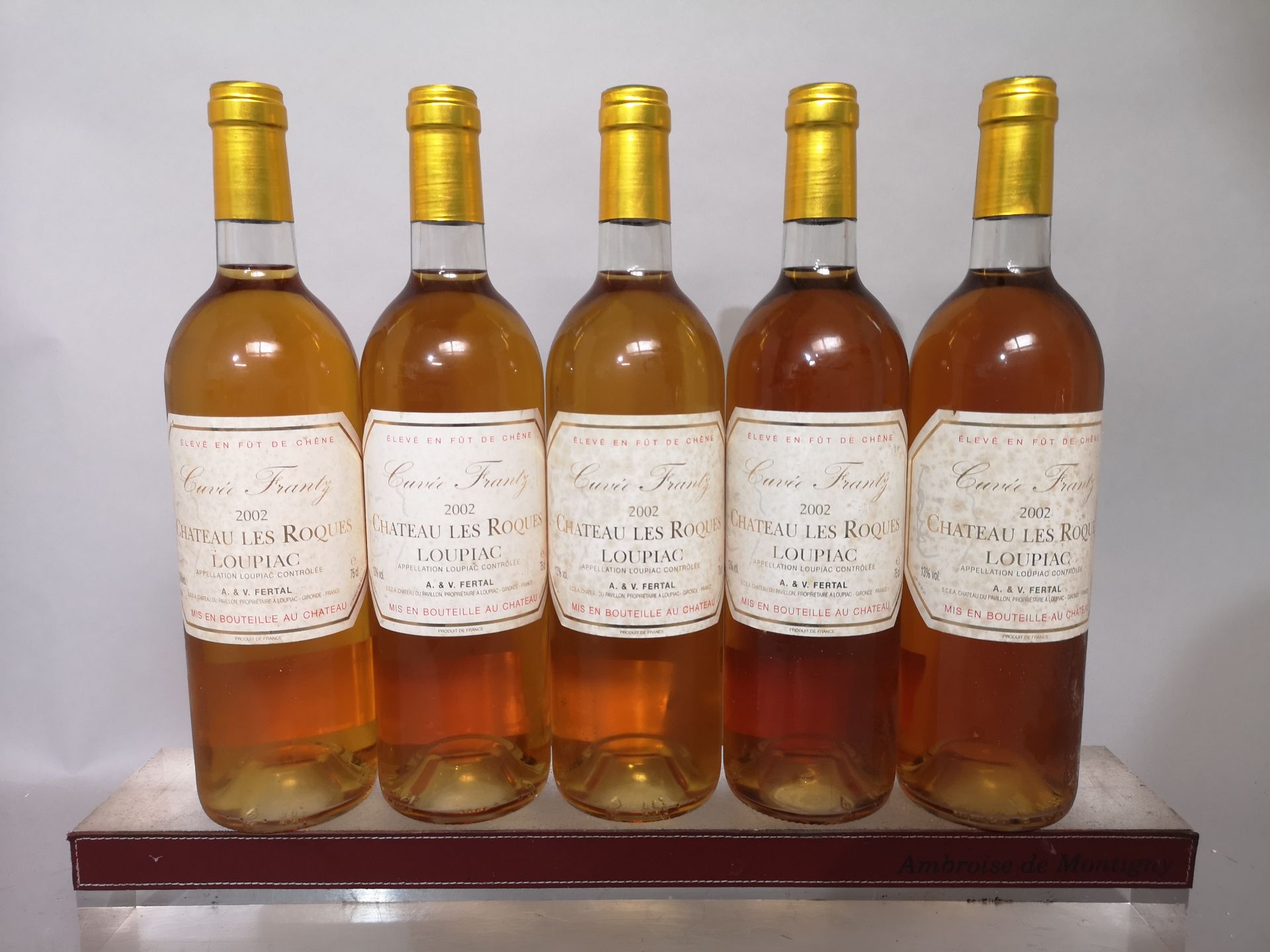 5 bottles Château LES ROQUES "Cuvée Frantz" - Loupiac 2002.
 Labels slightly stained.