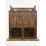 Partially golden natural wooden carrier furniture, the side panels decorated with characters in pavi