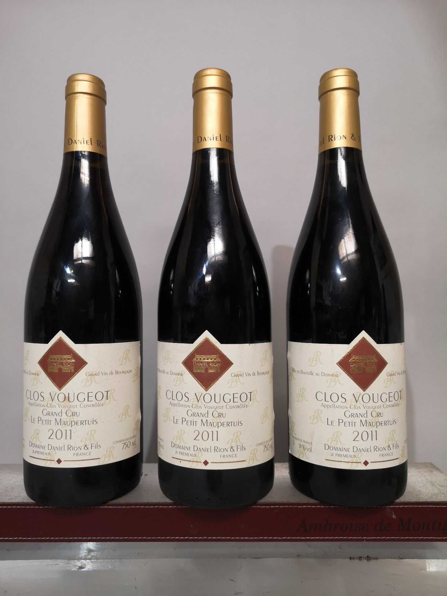 3 Clos Vougeot Grand Cru - Le Petit Maupertuis - Daniel Rion & Fils 2011 bottles.