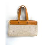 HERMES,Beige canvas tote and fawn color leather.With his sieca.Small stripes.H .: 25