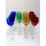 Set of 15 large colored crystal glasses, blue, green, yellow or red, with twisted feet.H .: 33 c