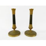 Pair of double golden and brown bronze bronze torchbones.Acanthes' patterned binets resting on a