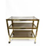 Quadrangular console in lacquered metal, with its smoked glass top, resting on 4 casters.H .: 70