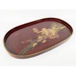 JAPAN,Oval wooden lacquered wood tray and golden enhancers representing a seillard holding a sam