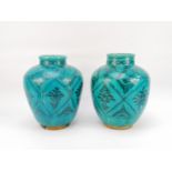 Iran, 19th century,Pair of vases of shape, swollen with turquoise glazed ceramic with fish decor