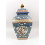 China, 20th centuryPotiche covered with porcelain, with an enameled polychrome decor of court la