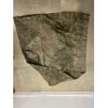 Camouflaged tent canvas.With its two leather straps.Germany, middle of the 20th century.