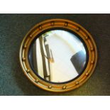 Regency style gilt framed butlers mirror