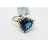 9ct gold London blue topaz and diamond ring