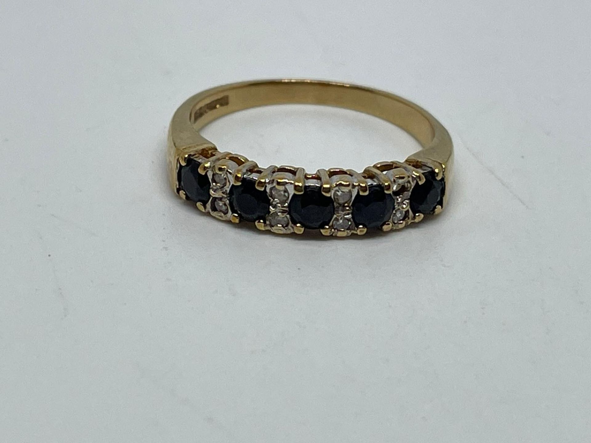 9 ct gold sapphire and diamond ring.