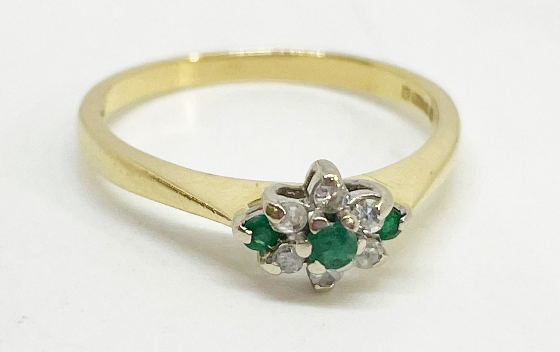 18 ct gold emerald and diamond cluster ring