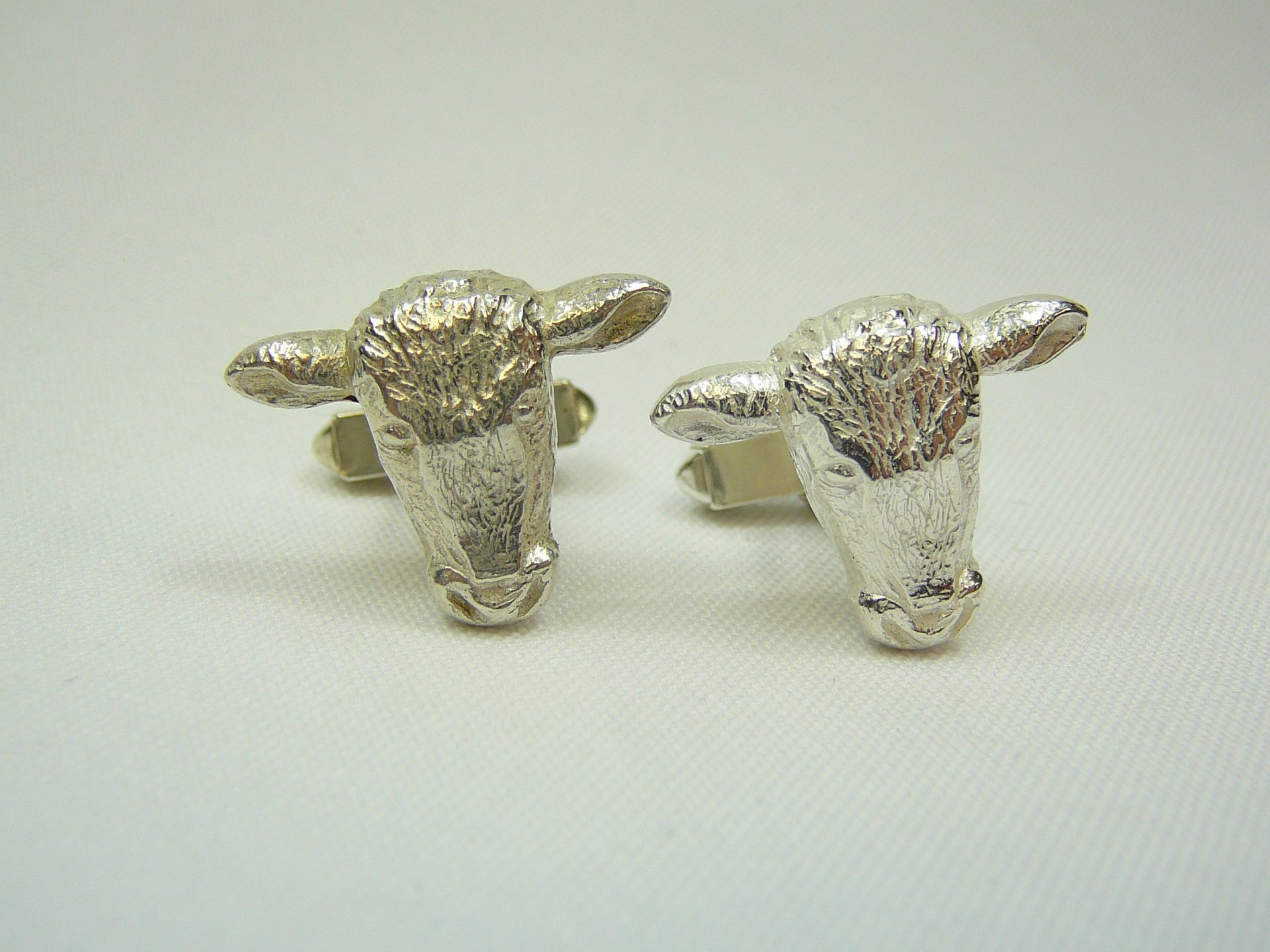 Pair of Devon Red silver cufflinks