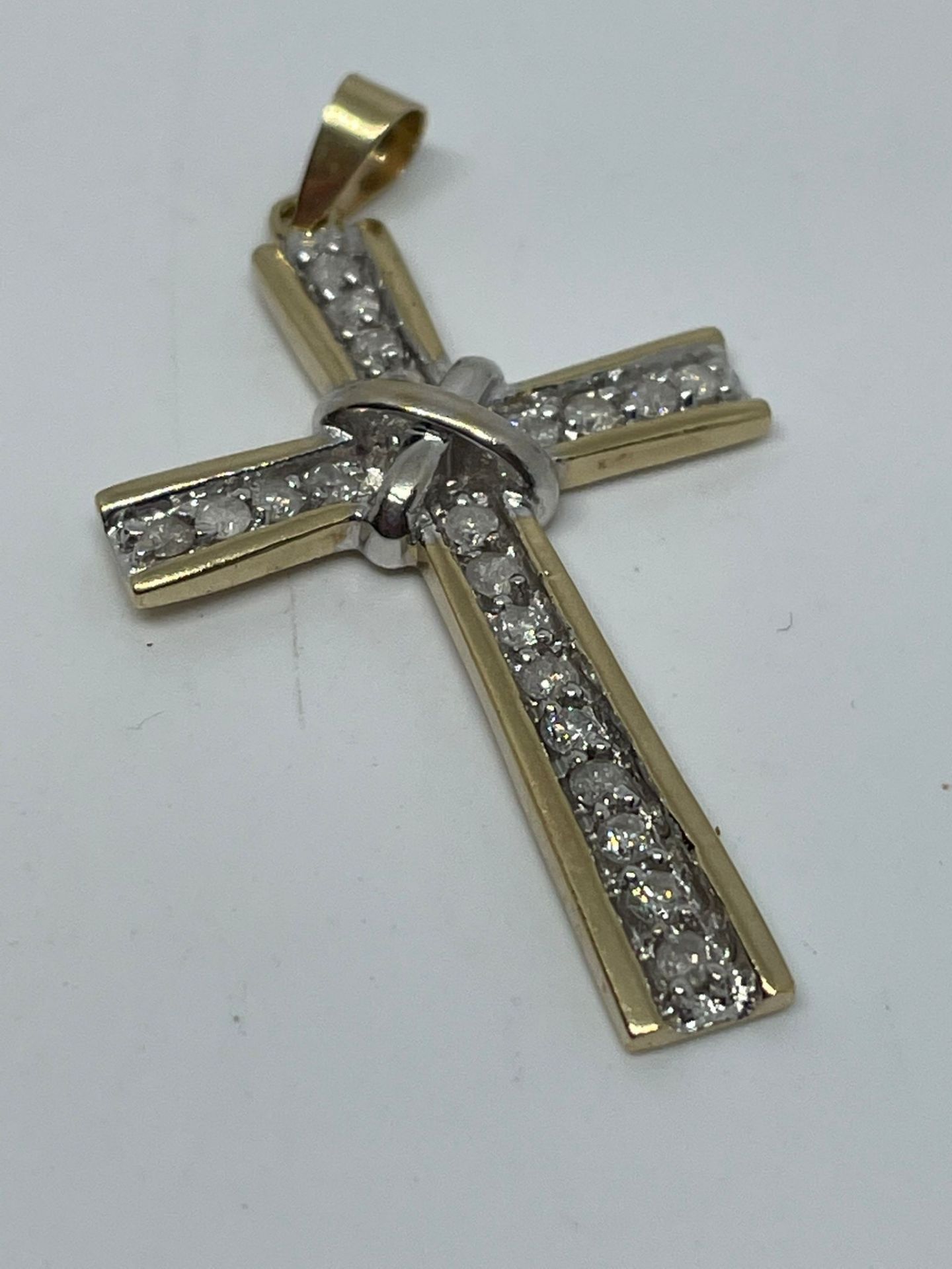 9 ct gold diamond cross