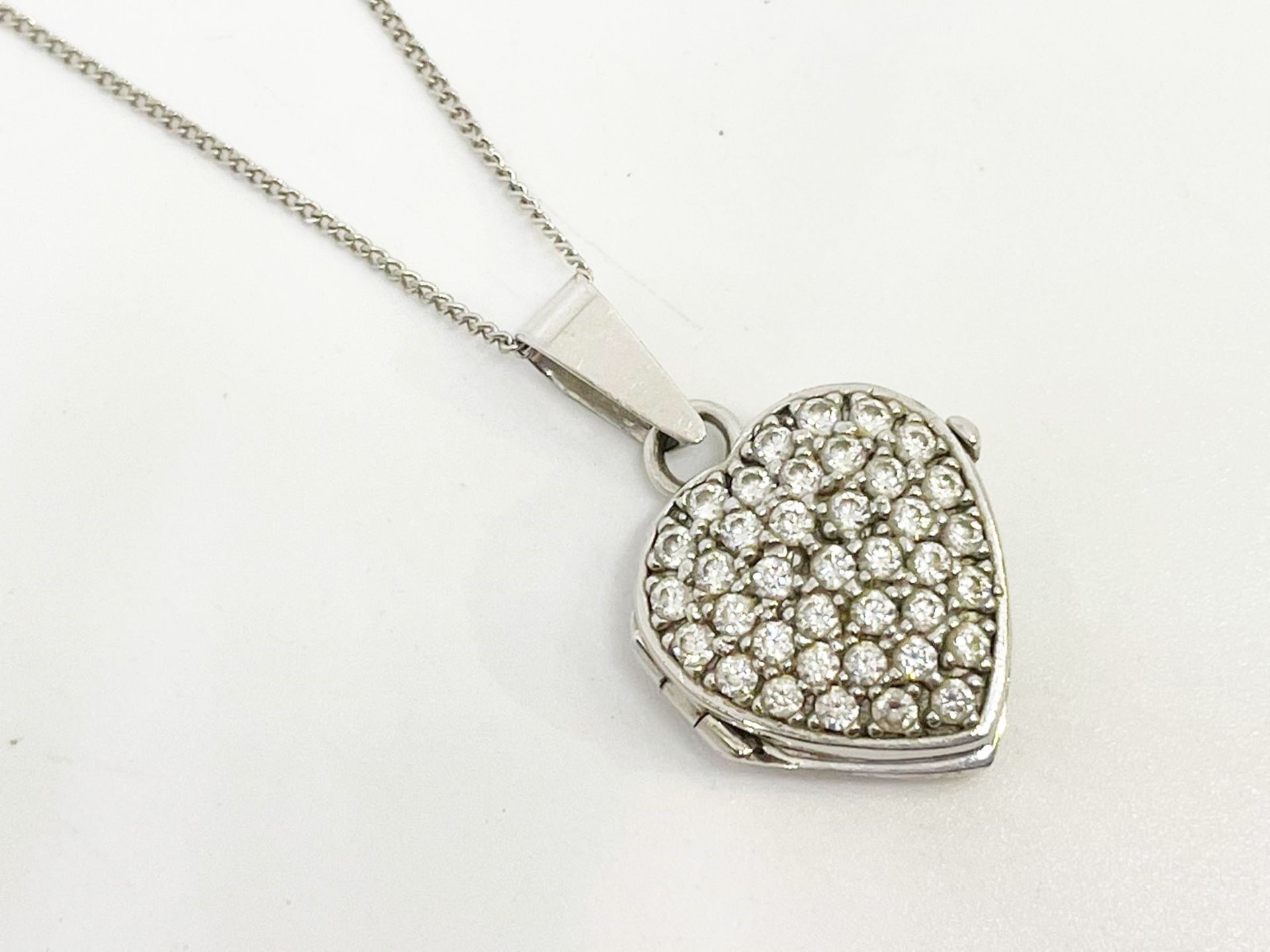 9 ct white gold CZ locket and chain