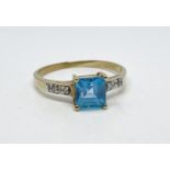 9 ct gold blue topaz and diamond ring