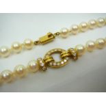 18ct gold and diamond set pearl string