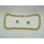 Faux pearl earrings and necklace