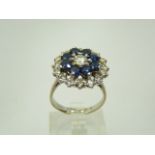 18ct white gold sapphire and diamond cluster ring