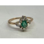 14 ct gold emerald and diamond ring