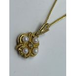 9 ct gold pearl and diamond pendant and chain