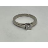 Platinum single stone diamond ring with princess cut