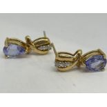 18 ct gold tanzanite and diamond stud earrings