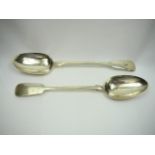 Matched pair of silver serving spoons