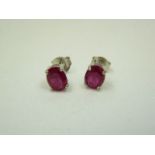 Ruby and silver earrings