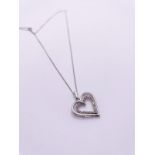 9ct white gold diamond heart pendant and chain