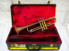 Cased brass trumpet