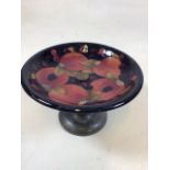 A Moorcroft Pomegranate Tazza on Tudric base - for restoration - large chip to underside of plate