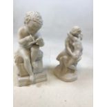 A Parianware figure of a studying boy H:28cm also with another figure of the kiss after Rodin