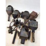 A quantity of vintage carriage lamps also with pots and brackets