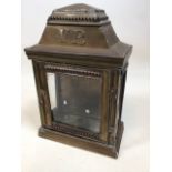 A brass wall hung candle lantern marked with VR cipher W:19.5cm x D:11cm x H:30cm