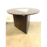 Tony McMullen. A unique coromander glass centre table circular top and cupboard to the base,