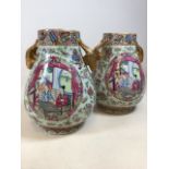 A pair of large 20th century Chinese vases with gilded handles. Red characters to base W:25cm x H: