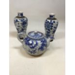 A blue and white Chinese ceramic tea pot and a pair of.blue and white crackle glazed vases signed to
