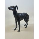 A large cast metal greyhound figure. H:29cm