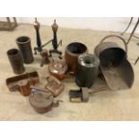 A collection of copper and brass wares. Coal scuttle, copper kettles etc.