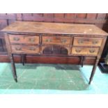A late 19th century writing desk. Five drawers with brass handles with rope twist turned legs. W: