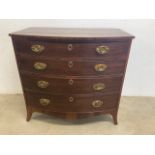 A mahogany inlaid bow fronted chest of four drawers. W:94cm x D:56cm x H:89cm