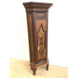 A Swedish pine corner cupboard with scumbled (hand painted wood grain effect) wood. With Nordic blue