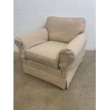 A modern upholstered arm chair. W:104cm x D:90cm x H:80cm