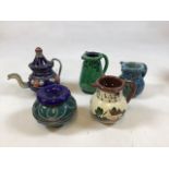 Puzzle jugs - Branham pottery and Watcombe pottery also with Moroccan style enamelled teapot and
